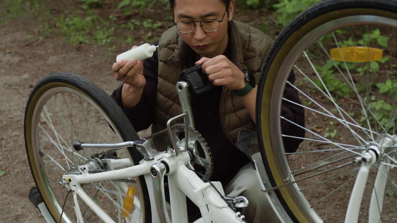 Man repairing a bicycle