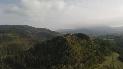 Lonely-remote-wilderness-mountain-hill-cottage-cabin-house-aerial-view