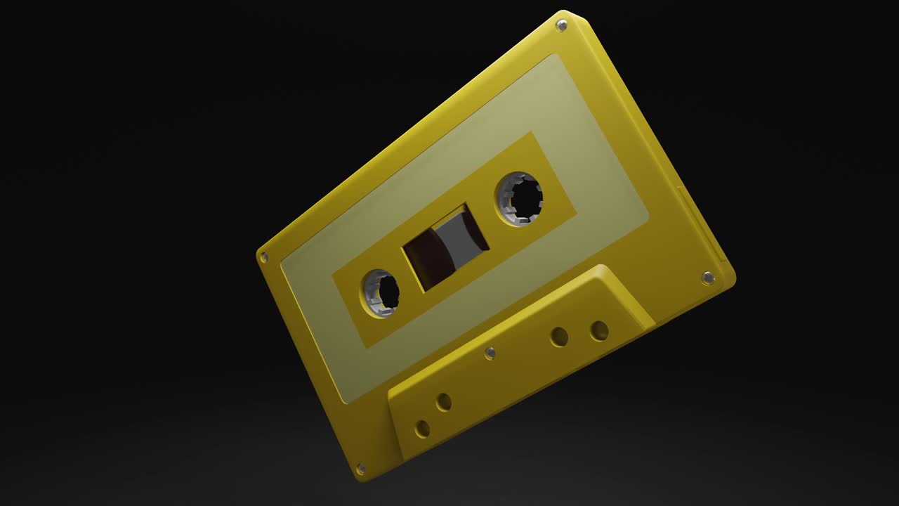 cinta de cassette amarilla aislada en un fondo negro. animado en 3d.