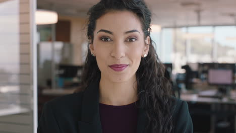 portrait-hispanic-business-woman-smiling-confident-manager-in-corporate-office-beautiful-female-executive-enjoying-successful-career-in-management-professional-at-work