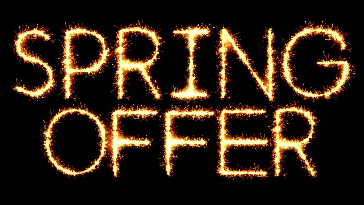 Spring offer text sparkler writing with glitter sparks particles firework on black 4k loop