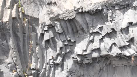 Camera-pans-from-right-to-left,-revealing-decorated-stones-at-Taormina,-Italy