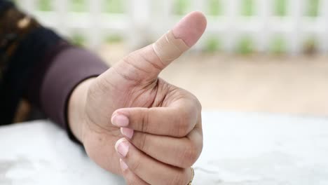 Adhesive-bandage-on-hand-close-up