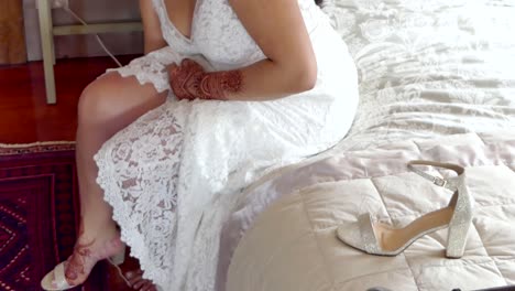 closeup-shot-of-the-bride-wedding-shoe