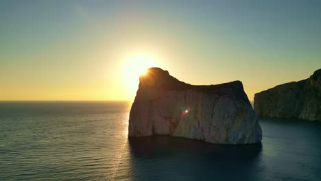 Pan-di-Zucchero-rock-cliff-near-Porto-Flavia-at-sunset,-Masua,-South-Sardinia,-Italy