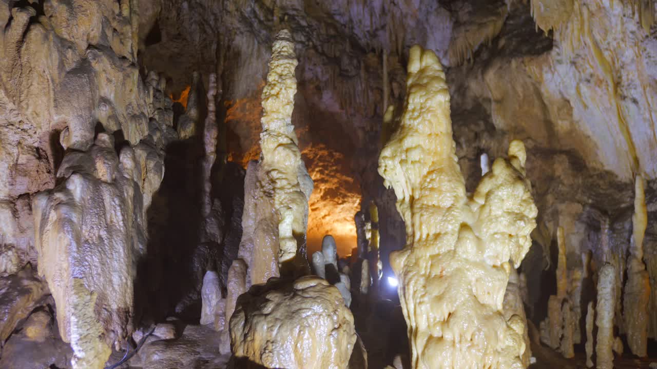 Underground Cave Formations With Stalactites And Stalagmites. Close-up Shot