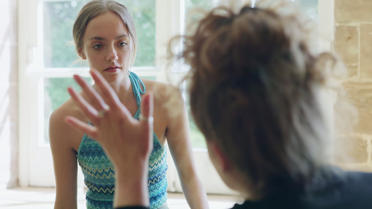 Portrait of two women with window background