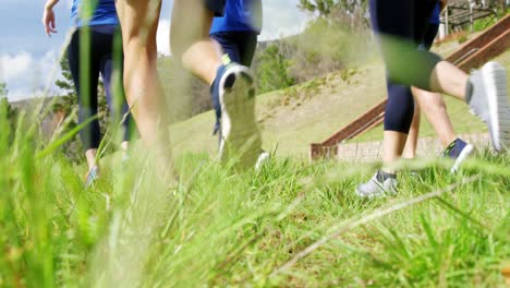 fit people jogging in boot camp 4k