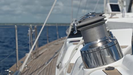 Close-up-of-sailboat-winch-while-navigation