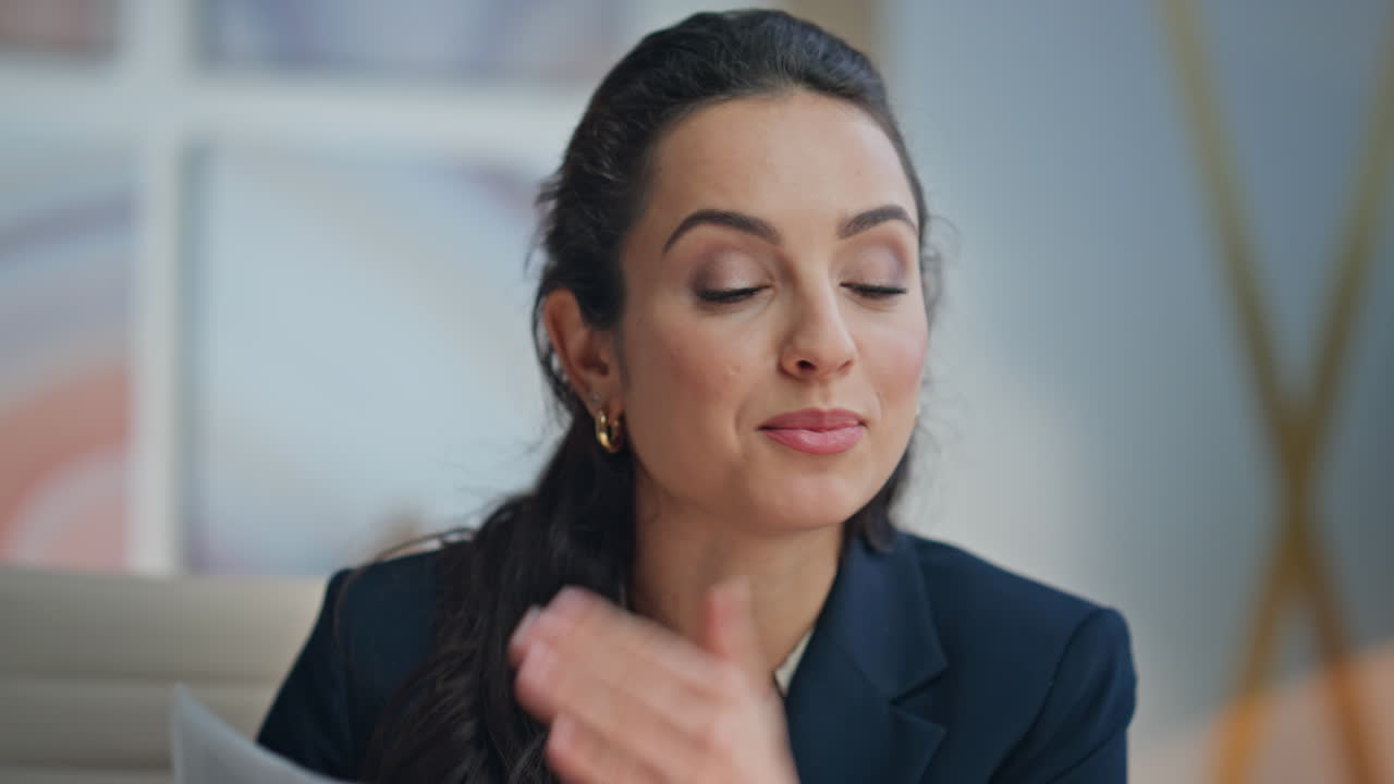 Laughing woman consulting video call at office closeup. Lady analyzing papers