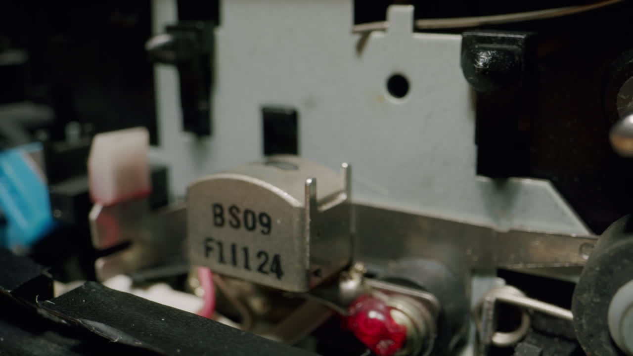Inside a vintage cassette tape recorder