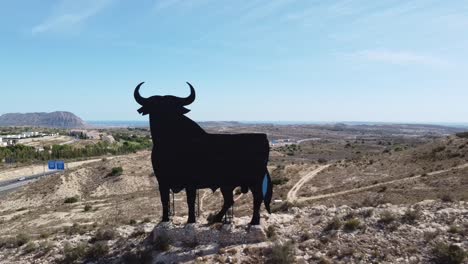 spanish  iconic bull billboard, sunny day.