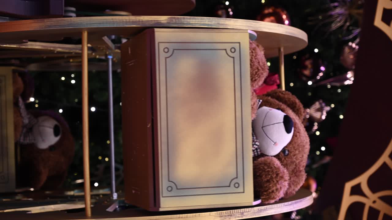 Teddy bear Christmas decorations at a shopping centre. Vertical