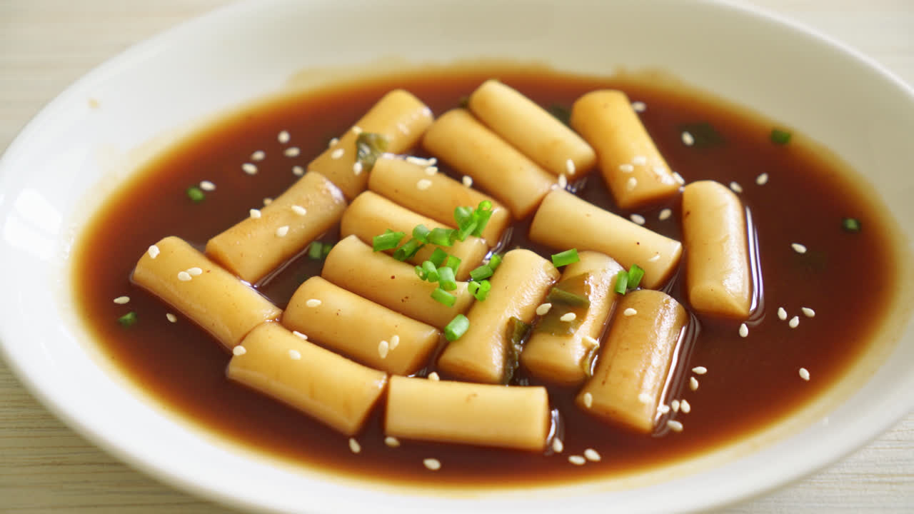 Spicy Jjajang Tteokbokki or Korean rice cake in spicy black bean sauce - Korean food style