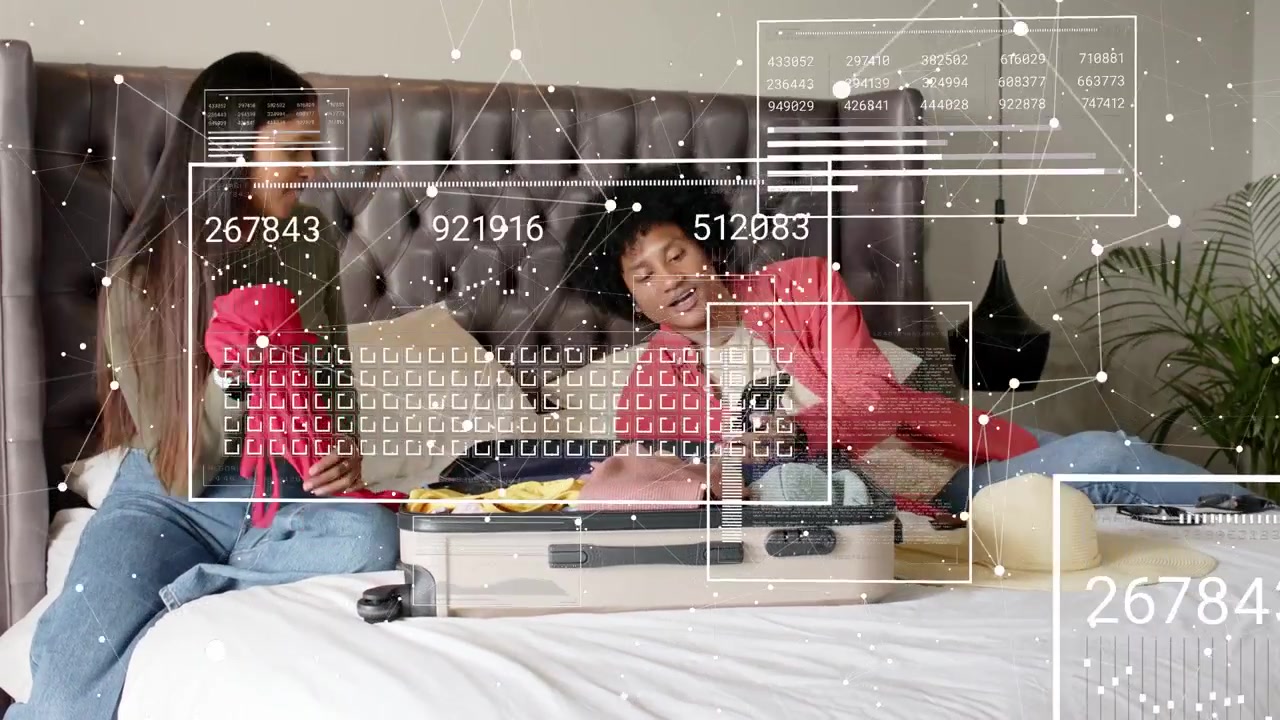 Man gesturing toward phone and woman packing case on bed, data overlays guiding choices for travel