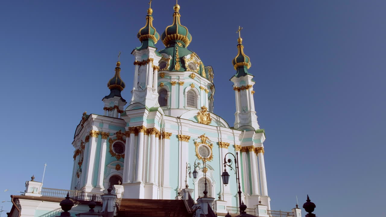 Wide tilt down the exterior of St Andrews Church Kiev on an early autumn morning