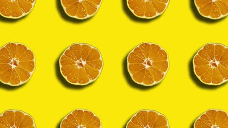 mandarin geometric pattern on a yellow background. simple motion graphics nature fruit animation