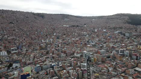 aerial adventure: plaza murillo, la paz skyline unfolds as the drone gracefully moves forward