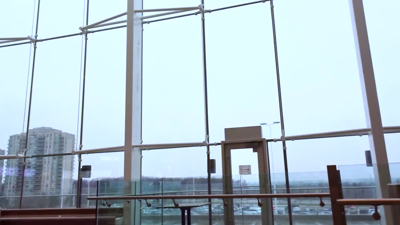 Various shots inside a modern, urban shopping center.