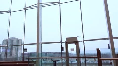 various shots inside a modern, urban shopping center.