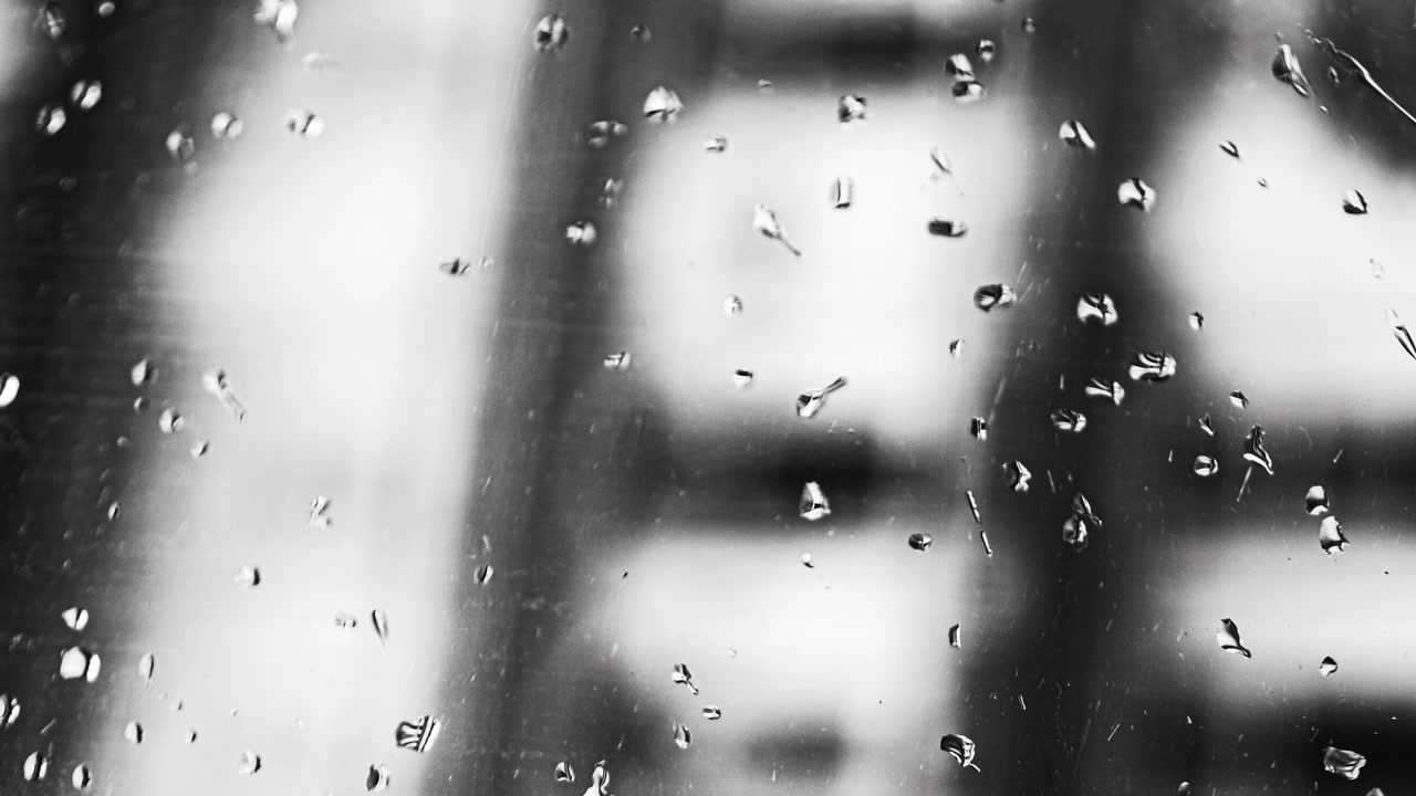 Water drops on glass surface abstract