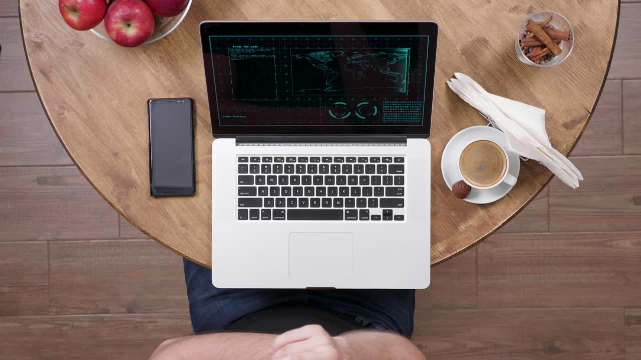 Laptop and Coffee on a Wooden Table