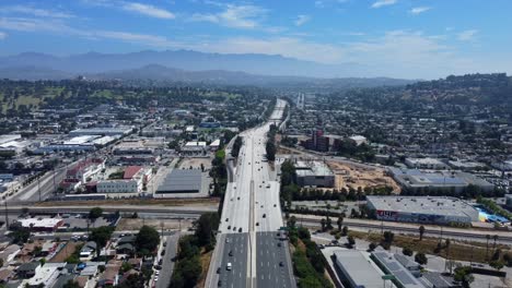 wide angle establishing drone shot californian city in hot summer sun