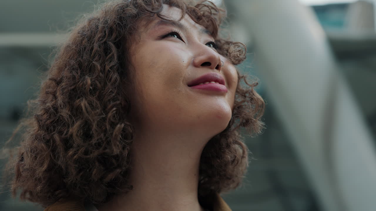 Smiling Woman Looking Up