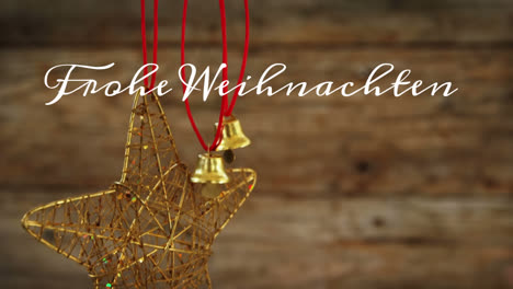 animation of german greeting text over golden bells christmas decorations