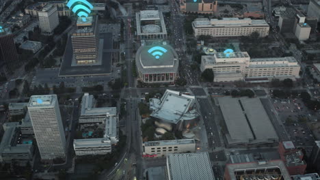 Forwards-fly-above-urban-borough-after-sunset.-Animated-Wifi-symbol-showing-available-access-points.-Los-Angeles,-USA