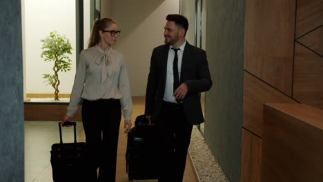 business people checking in at hotel