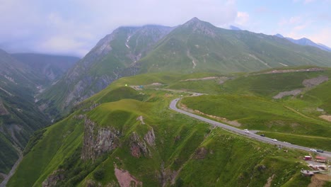 a scenic road winding through a mountainous landscape