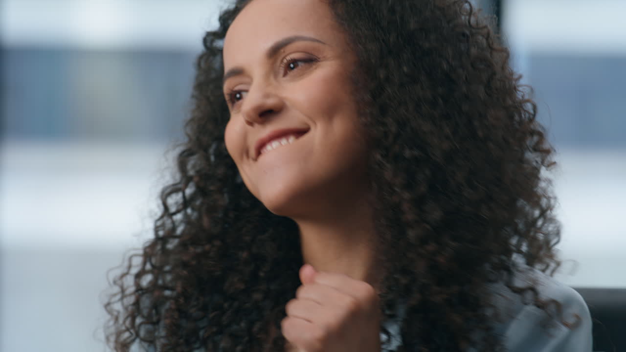 Amazed woman watching computer rejoicing at desk closeup. Employee saying wow