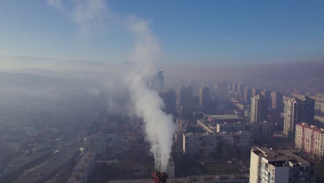 going through heavy smoke coming out of chimney in polluted city