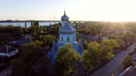 aerial footage of vilkovo city center - top view of church in summer, odessa region, ukraine