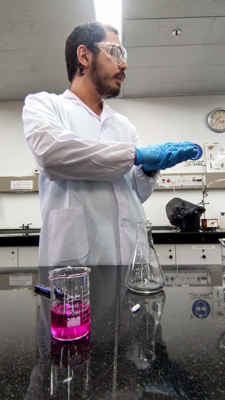 Male Scientist in Lab Coat Conducting Preparation