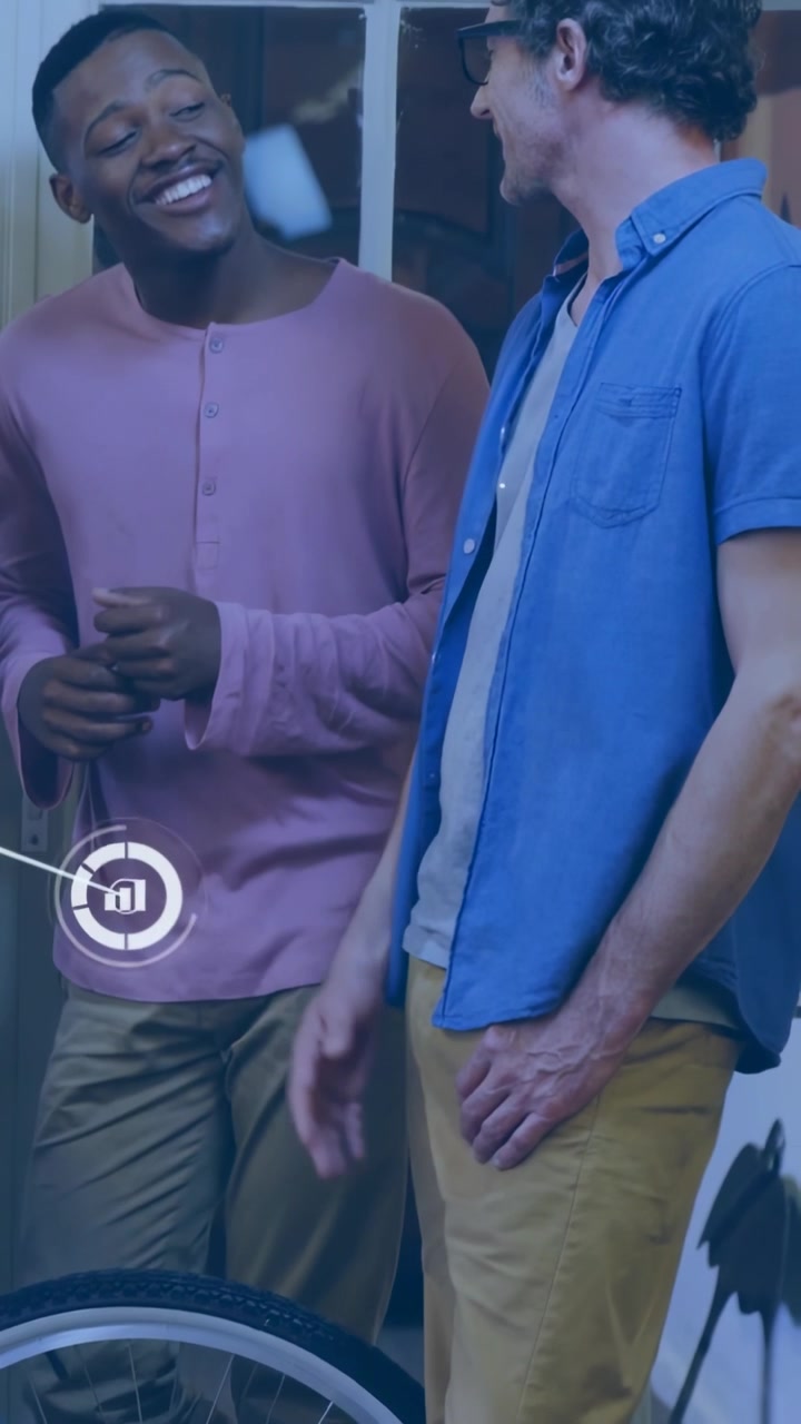 Vertical video: Two men catching up on porch, sparking technology icons overlaying and growing