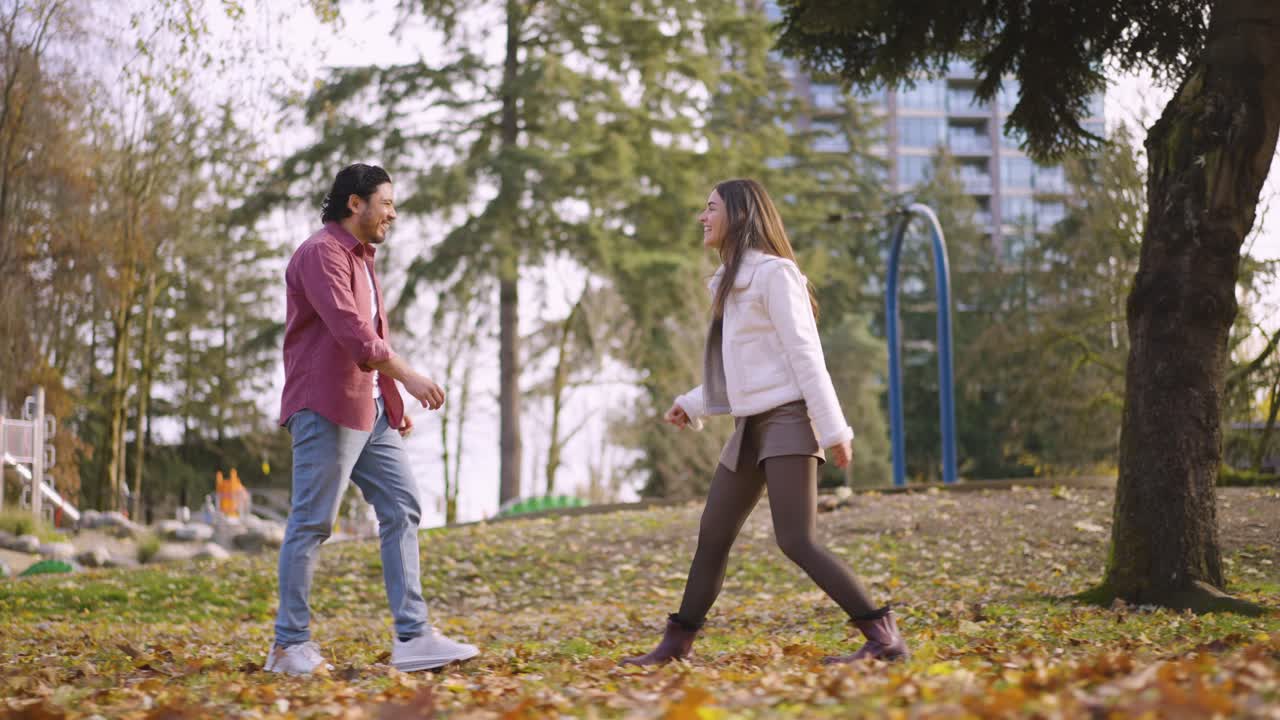 a couple leisurely enjoying their time in the park.