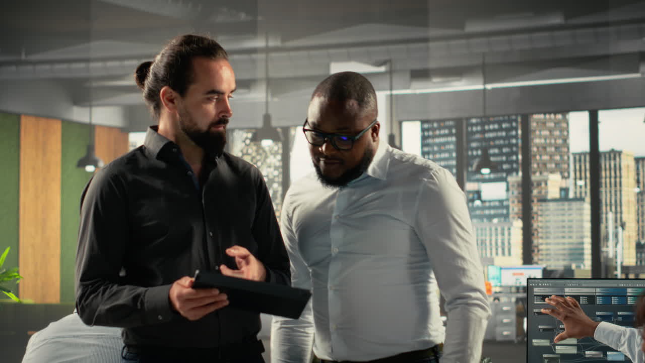 Vertical Video Diverse work team in a multinational company analyzing performance metrics