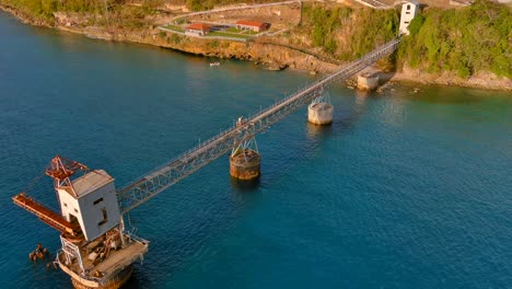 full view zoom in drone shot of a sugar cane pier located in aguadilla, puerto rico