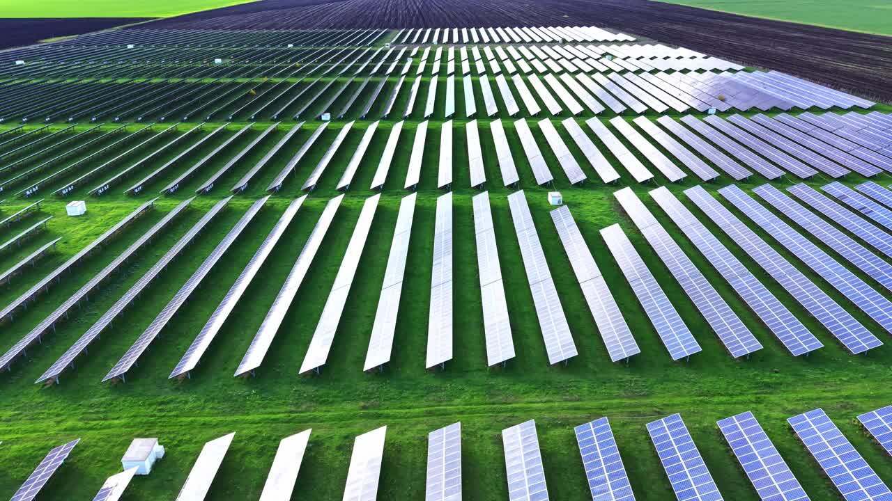 Solar panel farm aerial view showcasing rows of energy panels