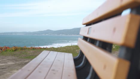 Wooden-bench-by-the-sea