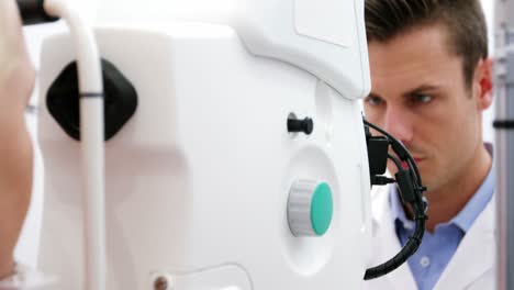 female patient looking through coreometry