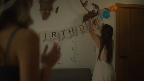 friends decorating for a birthday party