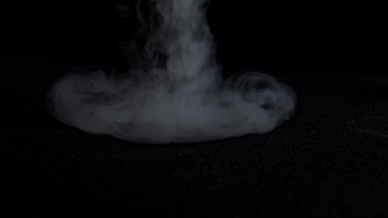 Smoke Spraying From Top To Down And Rotating , Slow Motion