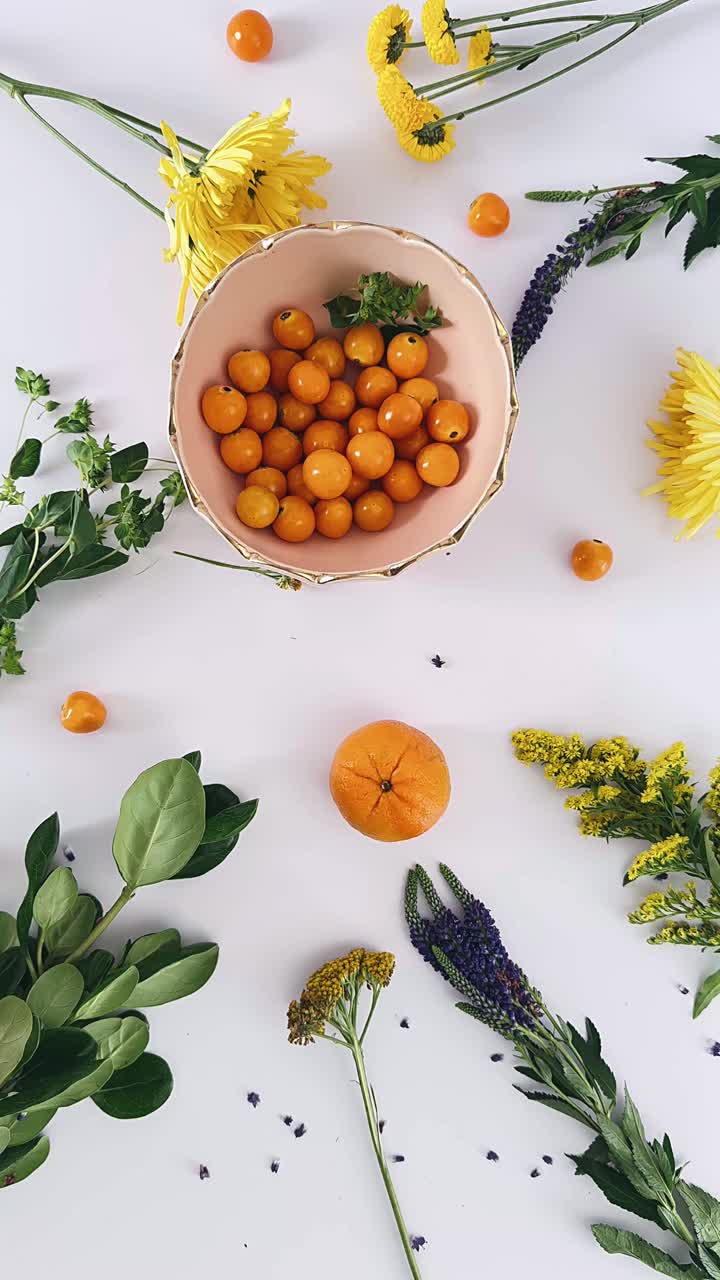 Vibrant Floral and Fruit Arrangement