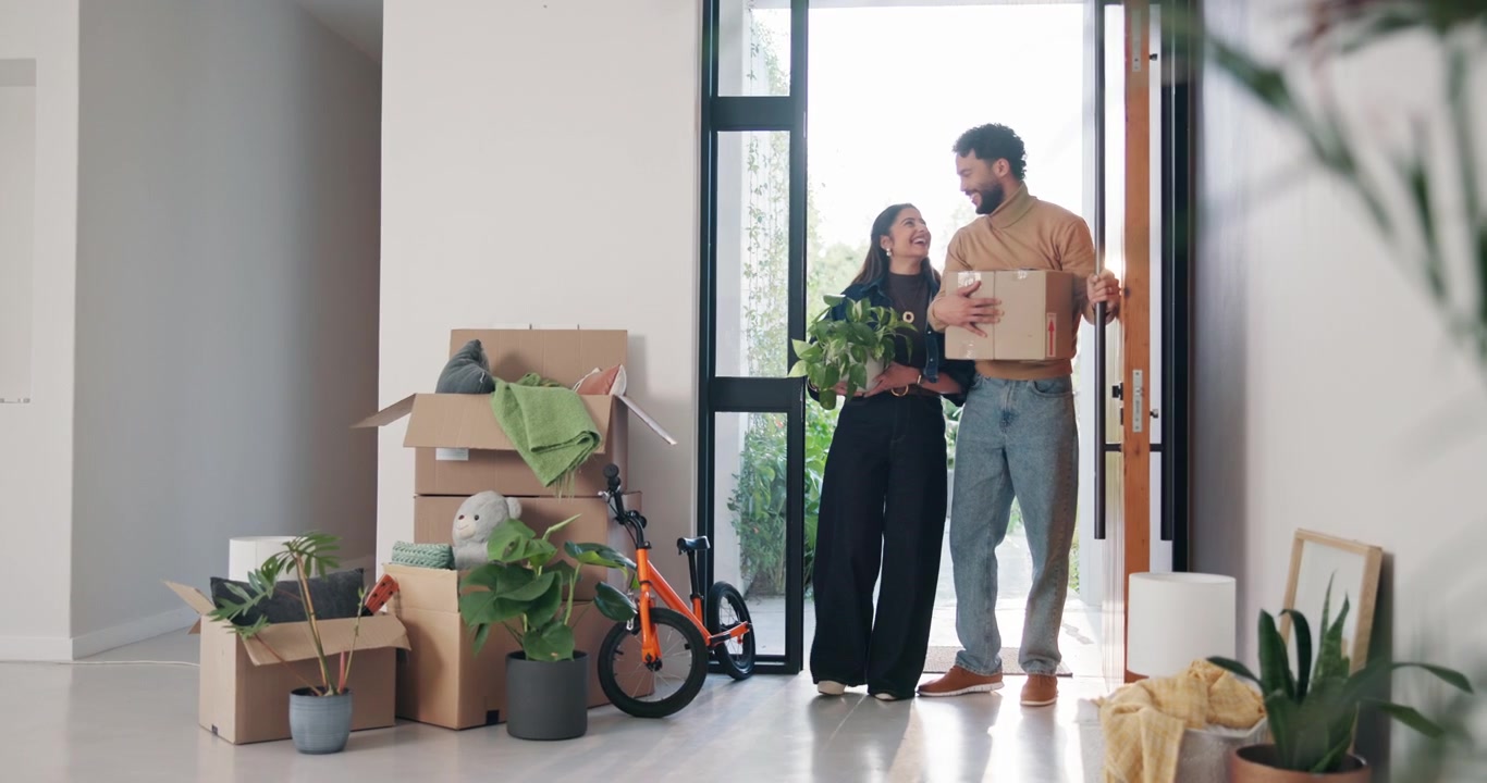 Happy Family Moving Into Their New Home