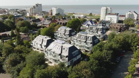 &quot;aerial view of 5 cozy vacation homes grouped together in northern germany