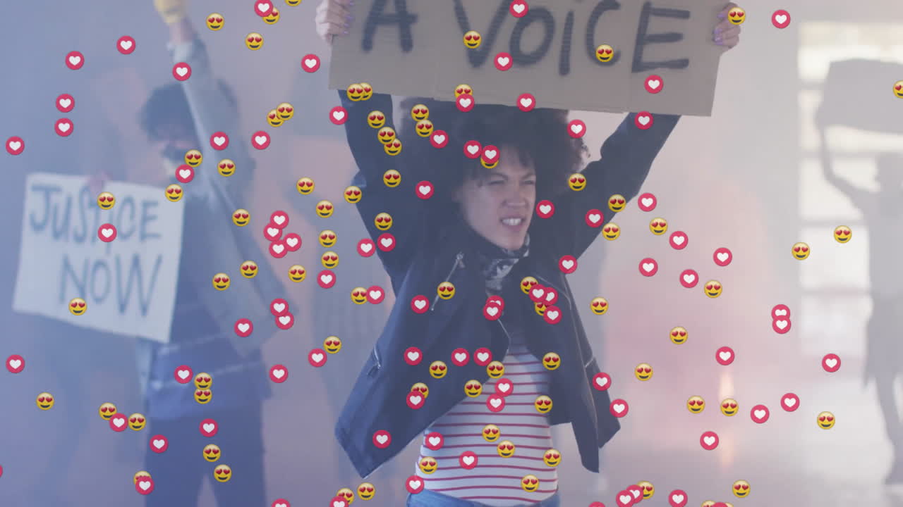 Animation of media icons over biracial people with signs protesting