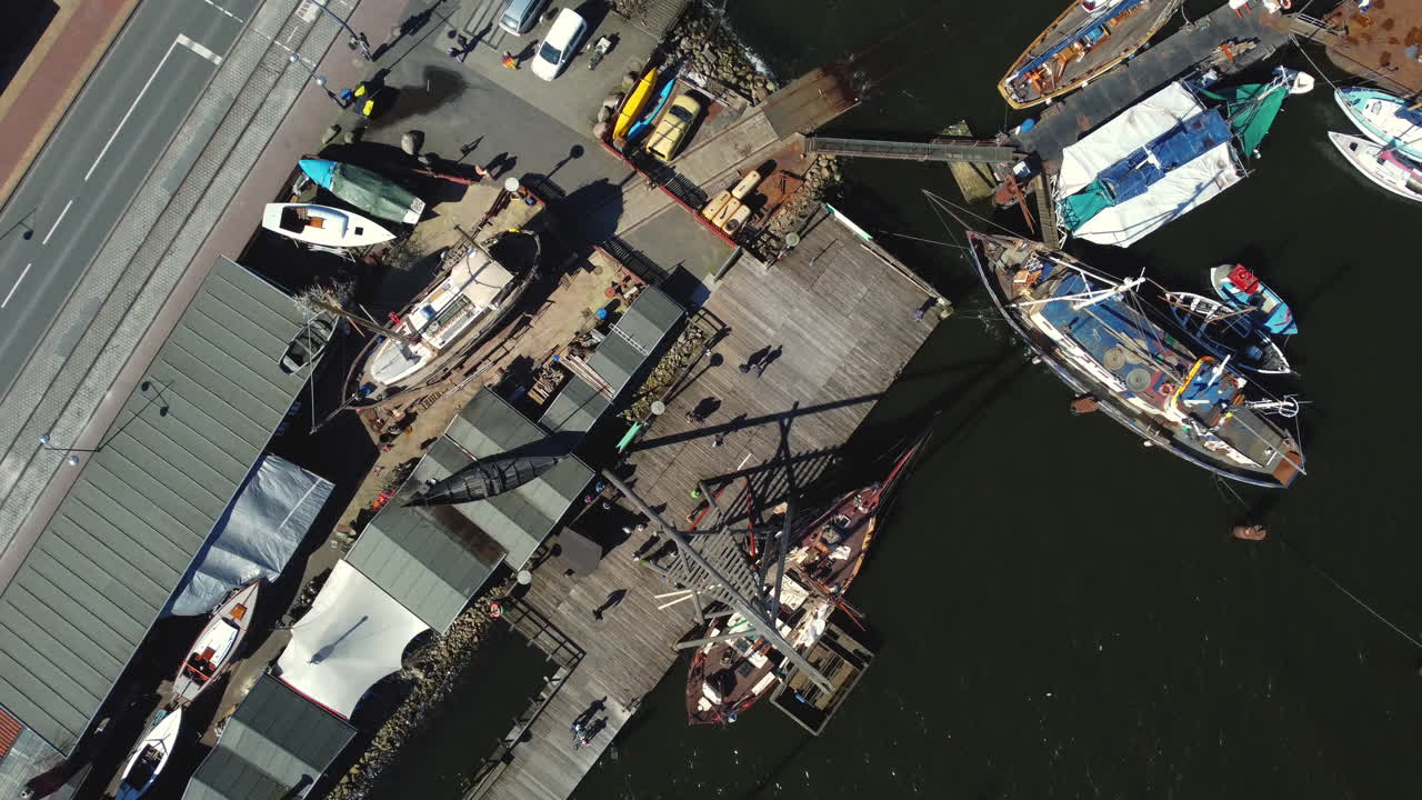 Aerial View of a Busy Harbor with Boats Under Repair